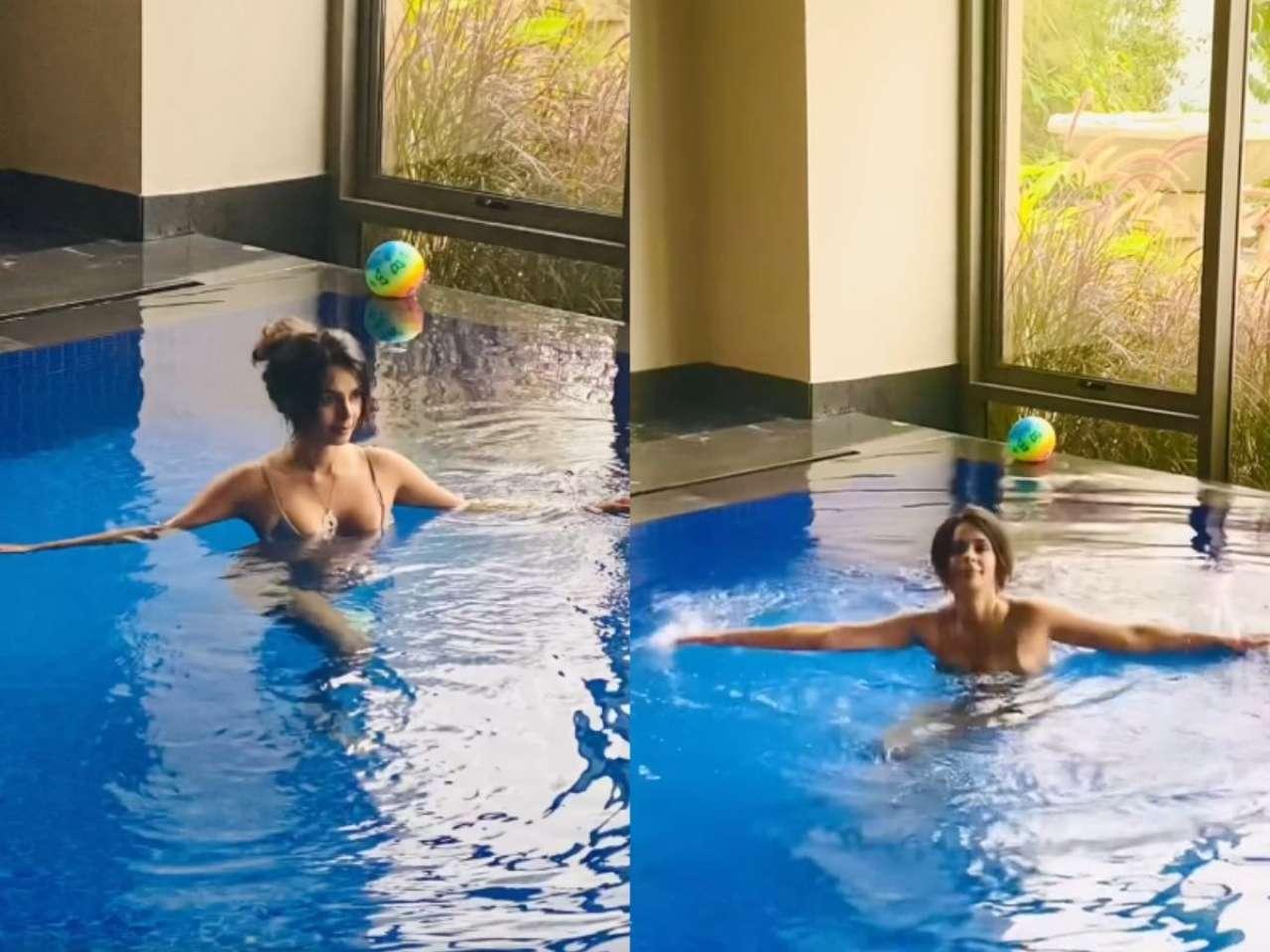 Mallika Sherawat enjoying the blue at indoor pool