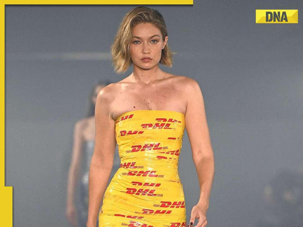 Paris Fashion Week: Gigi Hadid walks the Vetements runway in yellow tape-wrapped dress